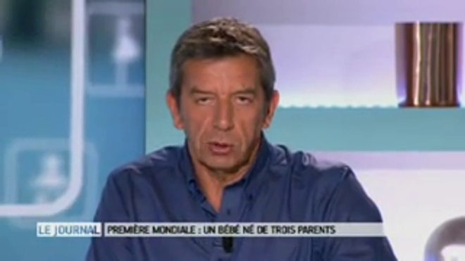 Image : Le Dr Zhang, tenant dans ses bras Abrahim Hassan quelques instants après sa naissance. (crédits : New Scientist) - Vidéo : les explications avec Marina Carrère d'Encausse et Michel Cymes.