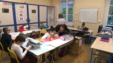 Des manuels scolaires à lire du bout des doigts