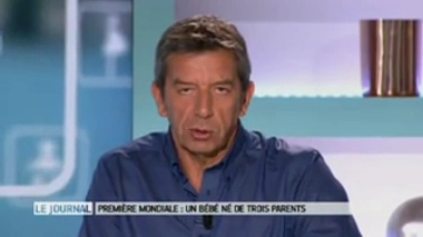 Image : Le Dr Zhang, tenant dans ses bras Abrahim Hassan quelques instants après sa naissance. (crédits : New Scientist) - Vidéo : les explications avec Marina Carrère d'Encausse et Michel Cymes.