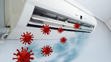 Si vous utilisez un climatiseur/ventilateur dans une pièce, il est important d'aérer celle-ci (photo d'illustration)